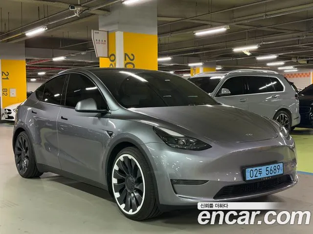 Tesla Model Y 2024 — photo 1