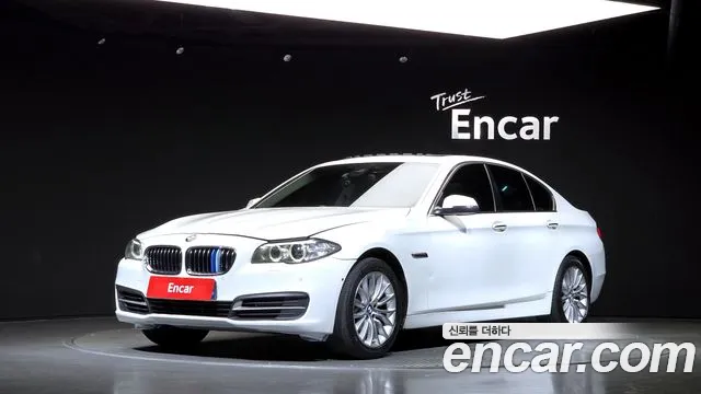 BMW 5-Series 2014 — photo 1