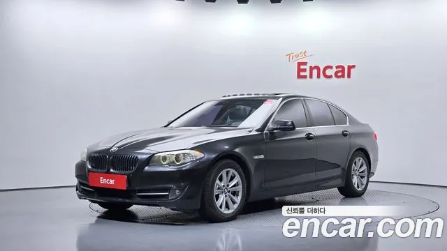 BMW 5-Series 2010 — photo 1