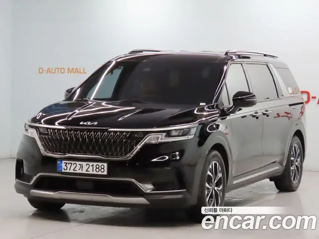 Kia Canival 2023 — photo 1