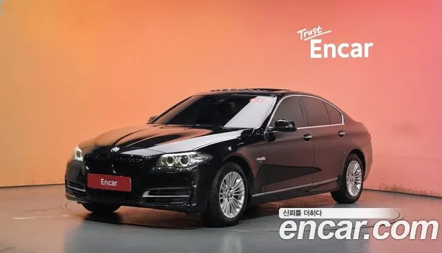 BMW 5-Series 2015 — photo 1