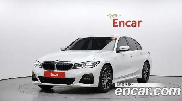 BMW 3-Series 2022 — photo 1