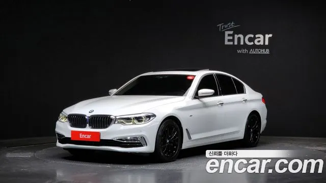 BMW 5-Series 2018 — photo 1