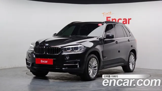 BMW X5 2014 — photo 1