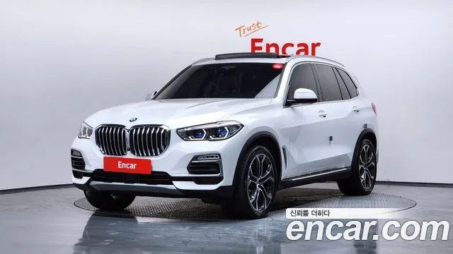 BMW X5 2021 — photo 1