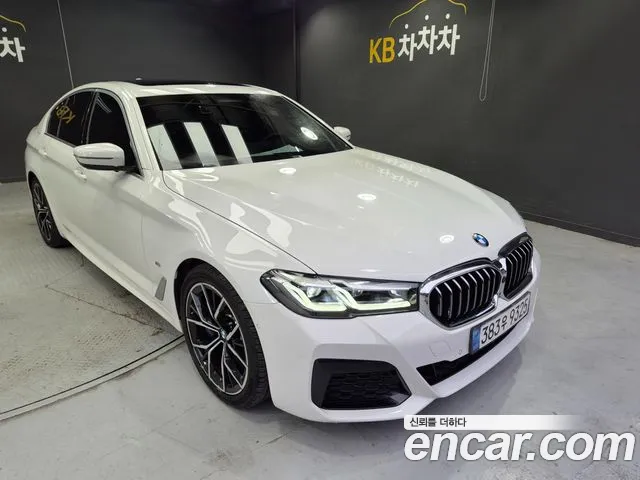 BMW 5-Series 2022 — photo 1
