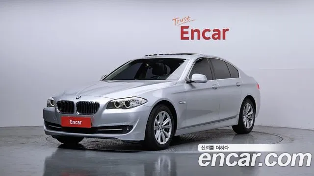 BMW 5-Series 2010 — photo 1