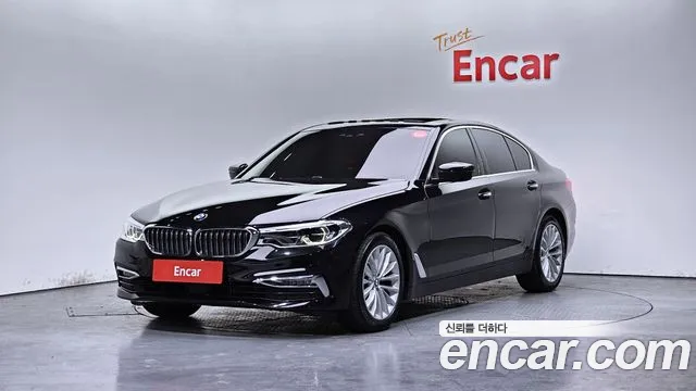 BMW 5-Series 2018 — photo 1