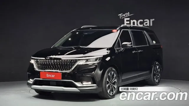 Kia Canival 2023 — photo 1