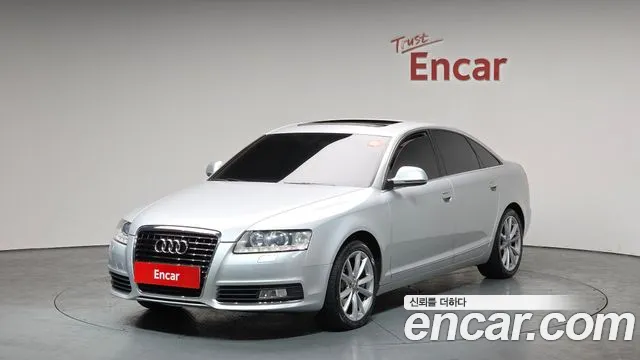 Audi A6 2010 — photo 1