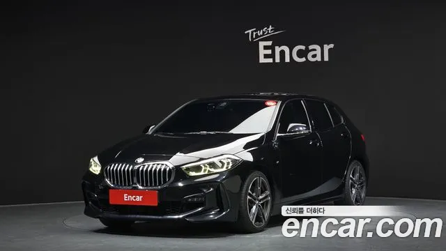 BMW 1-Series 2022 — photo 1