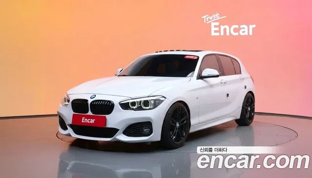BMW 1-Series 2018 — photo 1