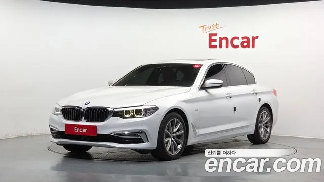 BMW 5-Series 2018 — photo 1
