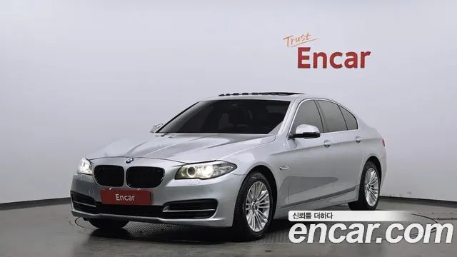 BMW 5-Series 2014 — photo 1
