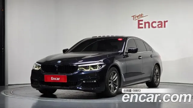 BMW 5-Series 2018 — photo 1