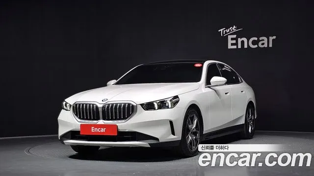 BMW 5-Series 2024 — photo 1