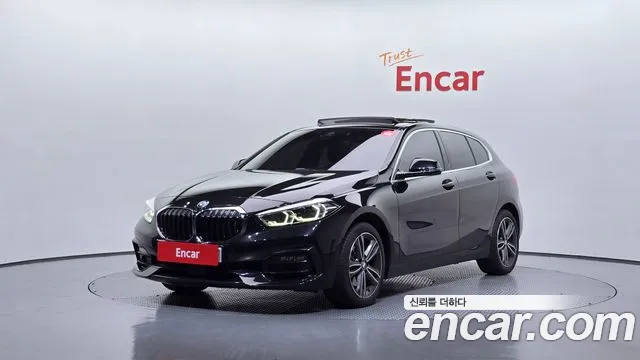 BMW 1-Series 2021 — photo 1