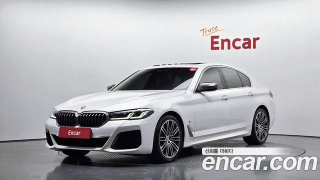 BMW 5-Series 2018 — photo 1