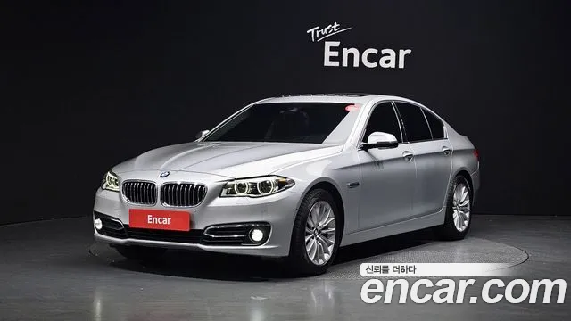 BMW 5-Series 2014 — photo 1