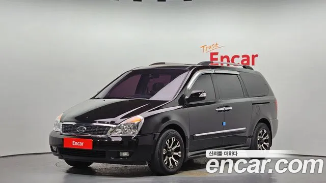 Kia Canival 2011 — photo 1