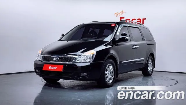 Kia Canival 2013 — photo 1