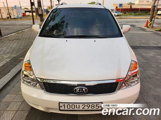 Kia Canival 2013 — photo 1