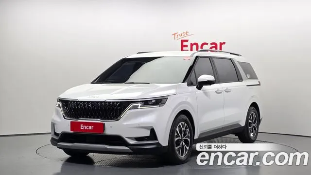 Kia Canival 2023 — photo 1