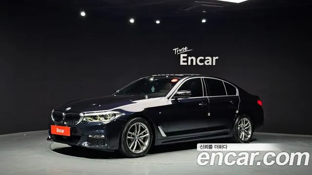 BMW 5-Series 2018 — photo 1