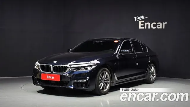 BMW 5-Series 2018 — photo 1
