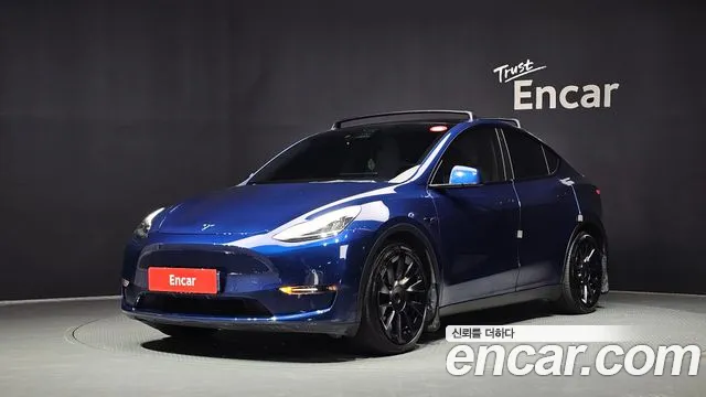 Tesla Model Y 2021 — photo 1