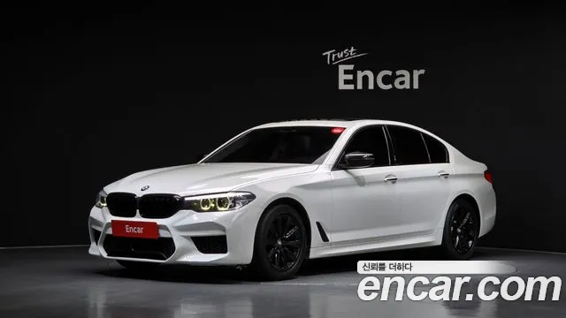 BMW 5-Series 2018 — photo 1