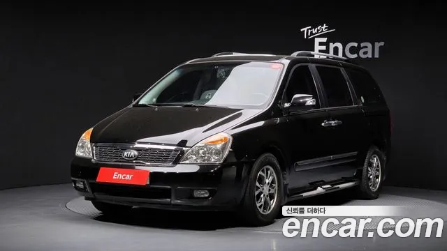Kia Canival 2013 — photo 1