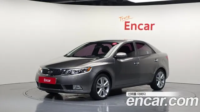 Kia Porte 2012 — photo 1