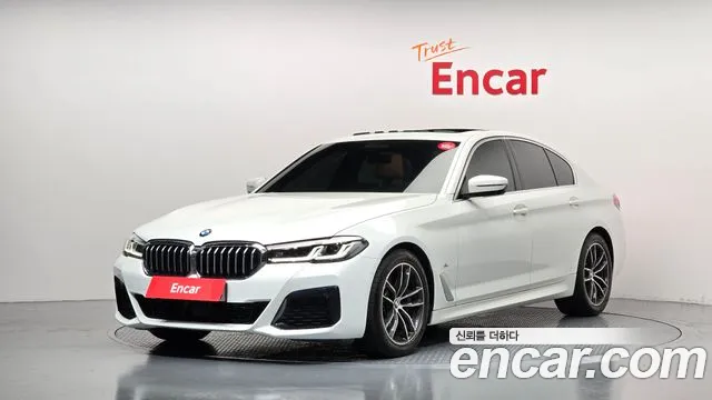 BMW 5-Series 2023 — photo 1