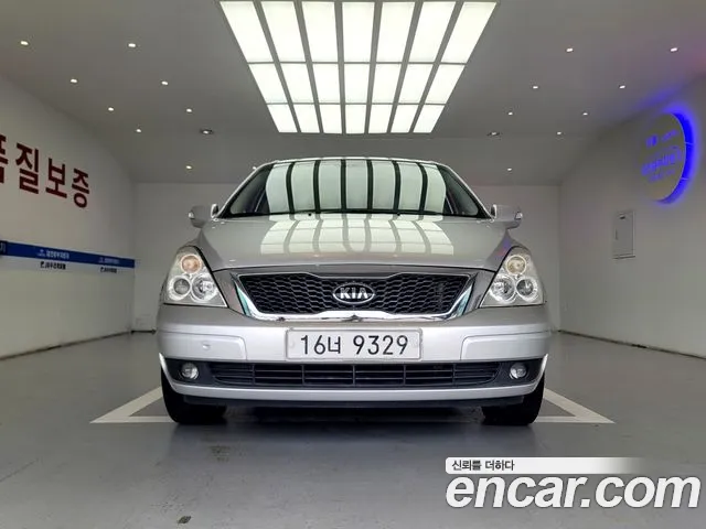 Kia Canival 2012 — photo 1