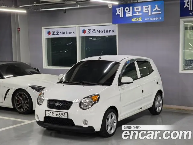 Kia morning 2011 — photo 1
