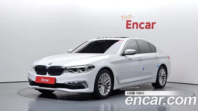 BMW 5-Series 2018 — photo 1