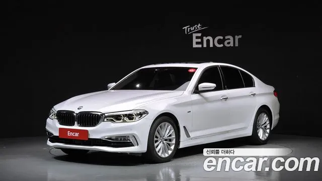 BMW 5-Series 2018 — photo 1
