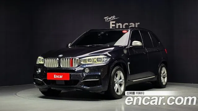 BMW X5 2014 — photo 1