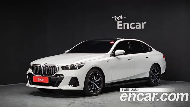 BMW 5-Series 2024 — photo 1