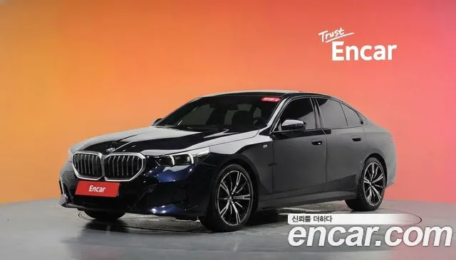 BMW 5-Series 2024 — photo 1