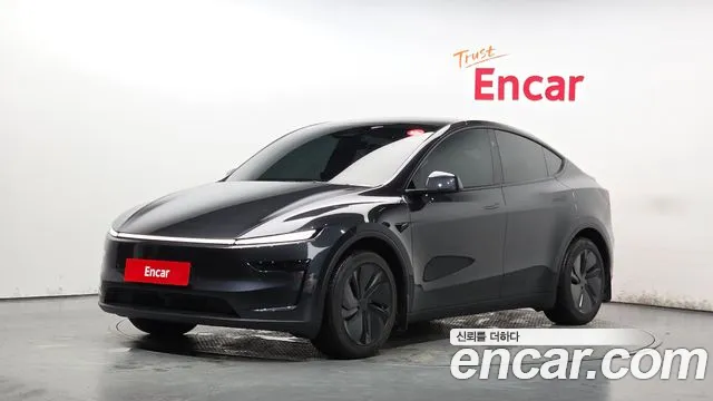 Tesla Model Y 2025 — photo 1