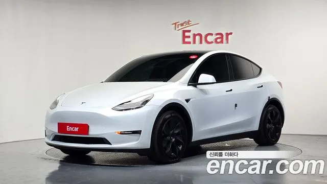 Tesla Model Y 2021 — photo 1