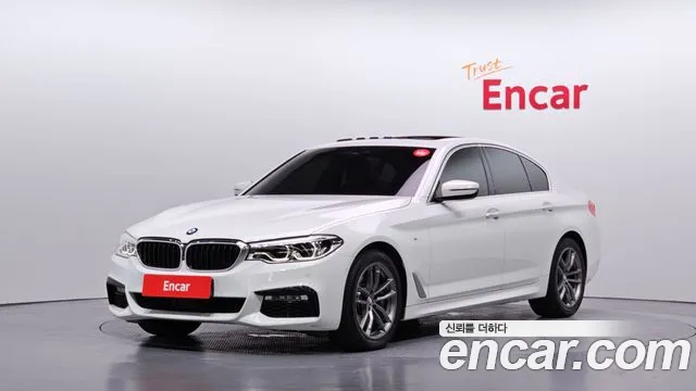 BMW 5-Series 2018 — photo 1