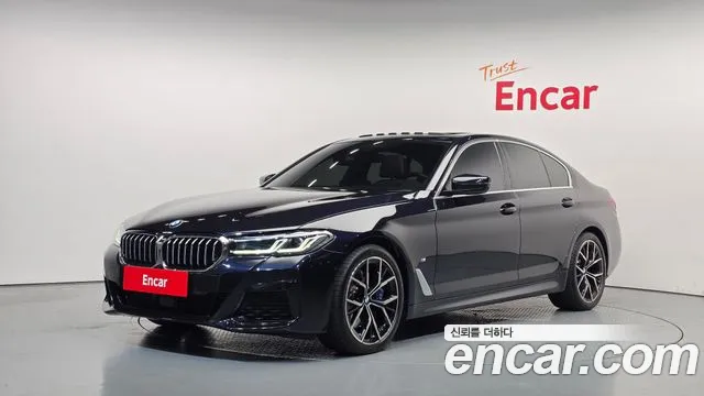 BMW 5-Series 2023 — photo 1