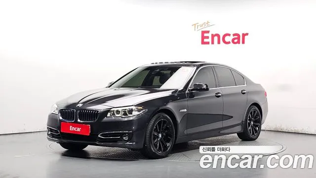 BMW 5-Series 2014 — photo 1