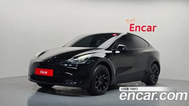 Tesla Model Y 2023 — photo 1