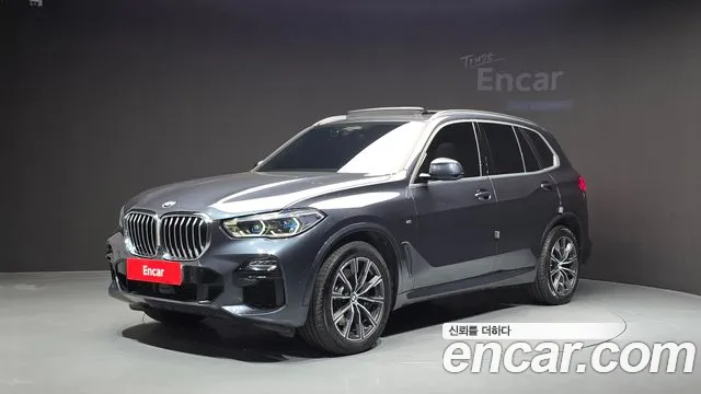 BMW X5 2021 — photo 1