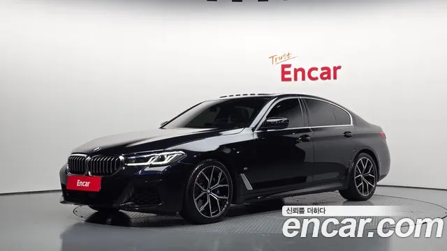 BMW 5-Series 2023 — photo 1