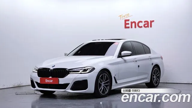 BMW 5-Series 2023 — photo 1